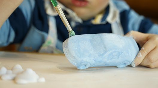 girl-painting-for-fun-pottery